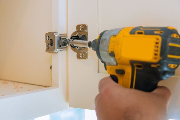 Cupboard Door Hinge Repair in Elgin